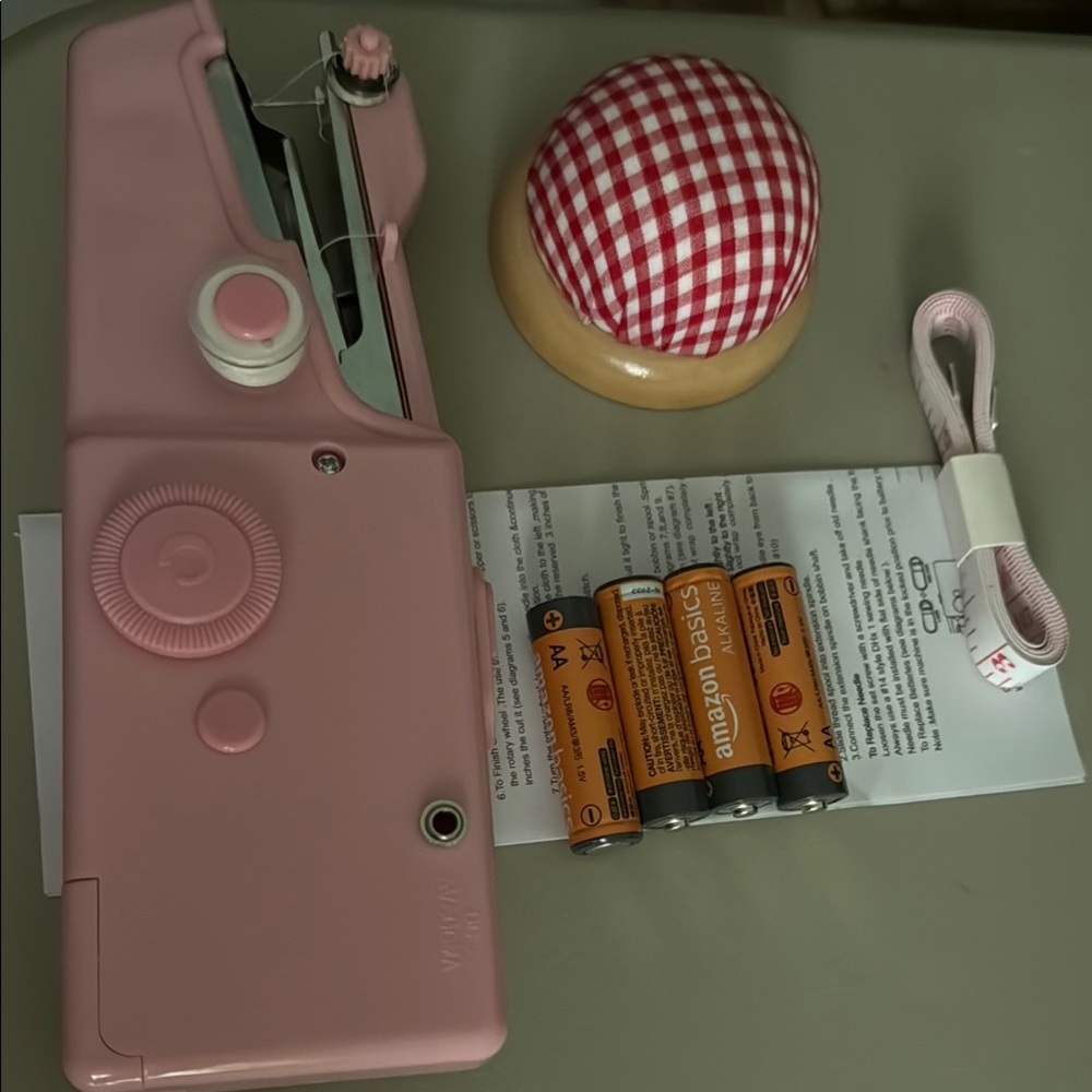 Pink Handheld Sewing Machine with Accessories NWOT